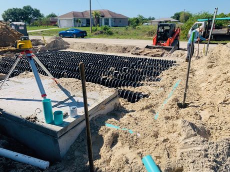 Two Big Trucks Tipper at Work — Cape Coral, FL — Linda Trucking, Inc.