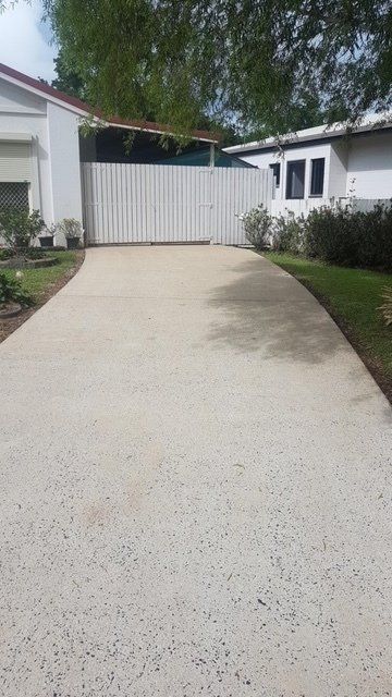 A House With A Beautiful Garden — Tropical Cleaning Services in Innisfail, QLD