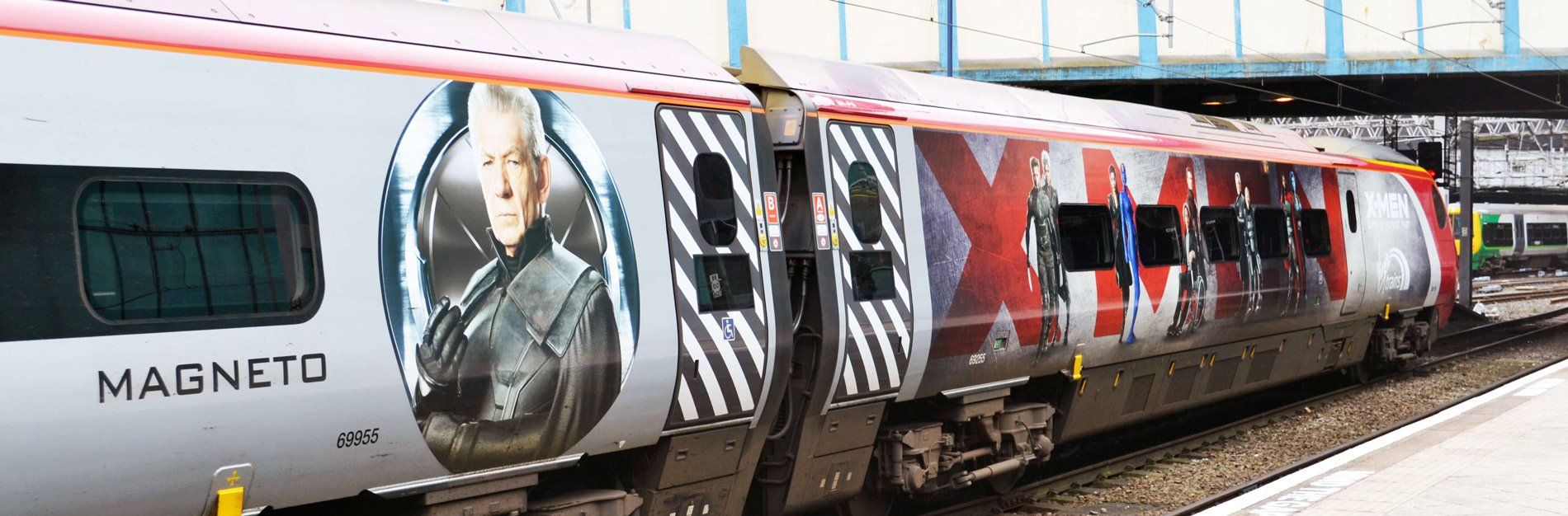 A train wrapped with Maneto from the X-Men on the side of it.