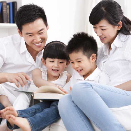 Happy family group studying together