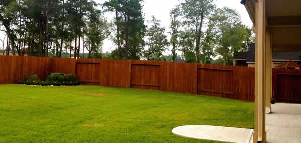 Stained Backyard Fence — Pearland, TX — Fence Keeper