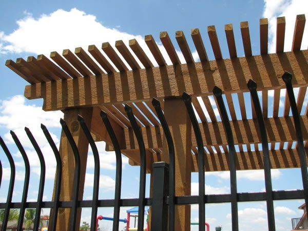 Curved Top Steel Fence — Pearland, TX — Fence Keeper