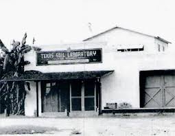 A black and white photo of a texas soil laboratory building.