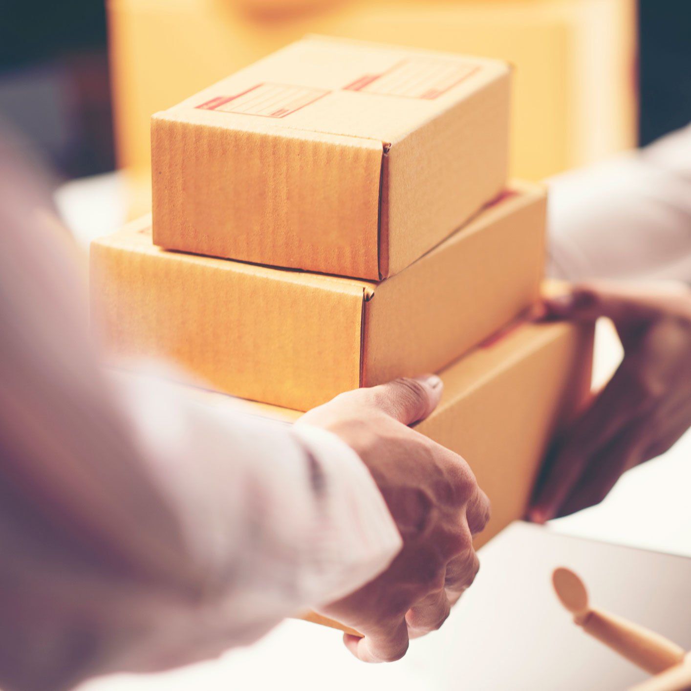 Home Relocation — Delivery Guy Giving the Packages in Jackson, MS Home Relocation — Delivery Guy Giving the Packages in Jackson, MS