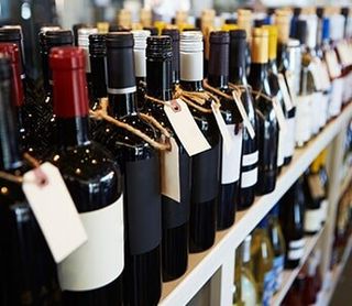Bottles Of Wine On Display In Delicatessen — Liquor Store in Wilmington, DE Bottles Of Wine On Display In Delicatessen — Liquor Store in Wilmington, DE