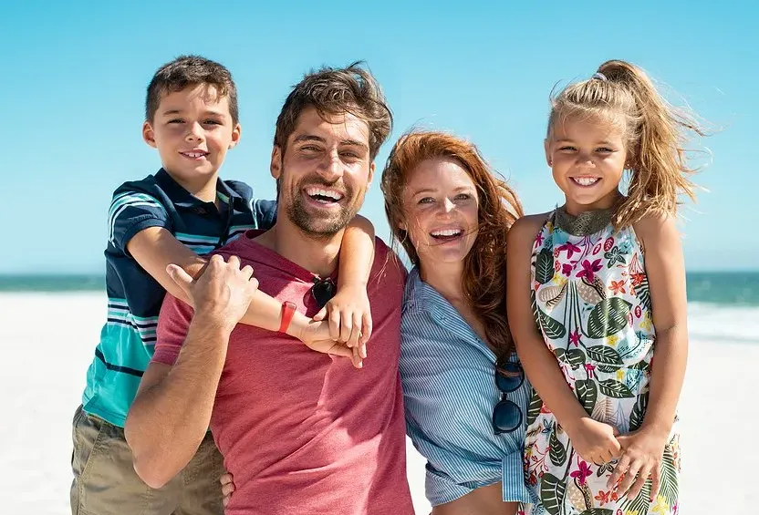 smiling family at beach