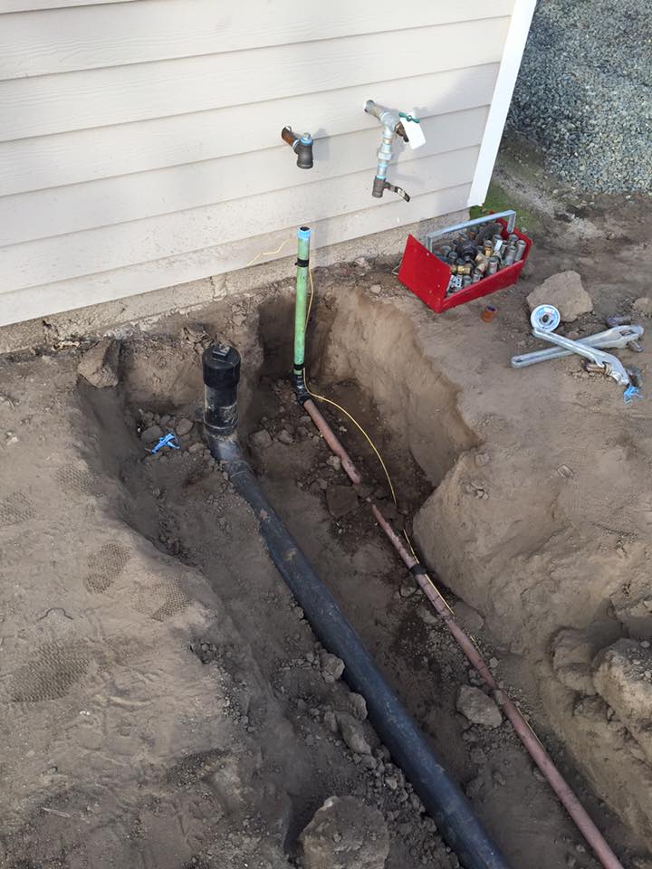 Plumber installing pipe – home plumbing Tulare CA

