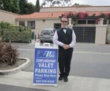 Valet Services - Valet Giving Car Key To Businessperson in Garden Grove, CA