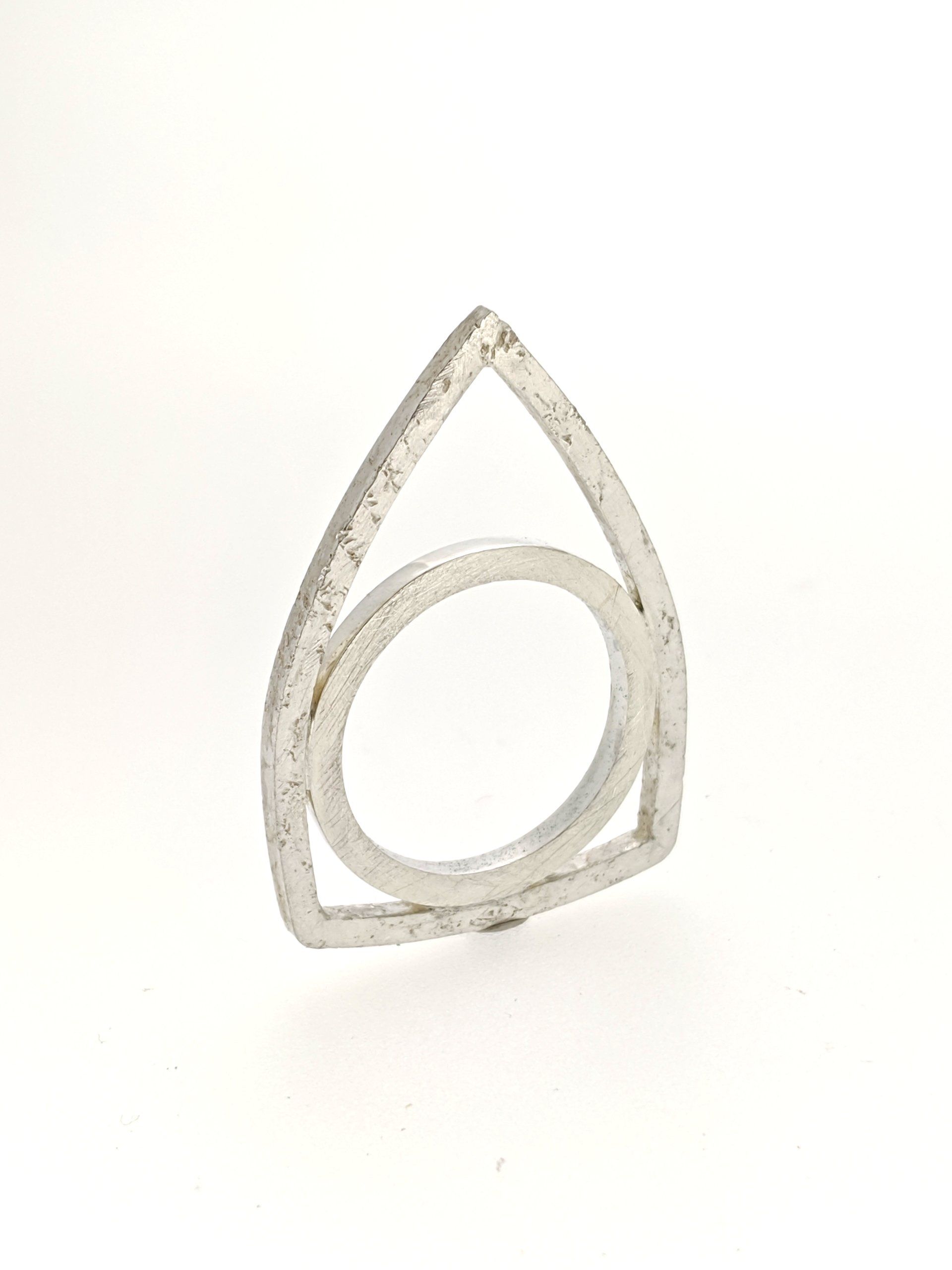 Reflections in Stone: Textured and polished sterling silver all in one ring