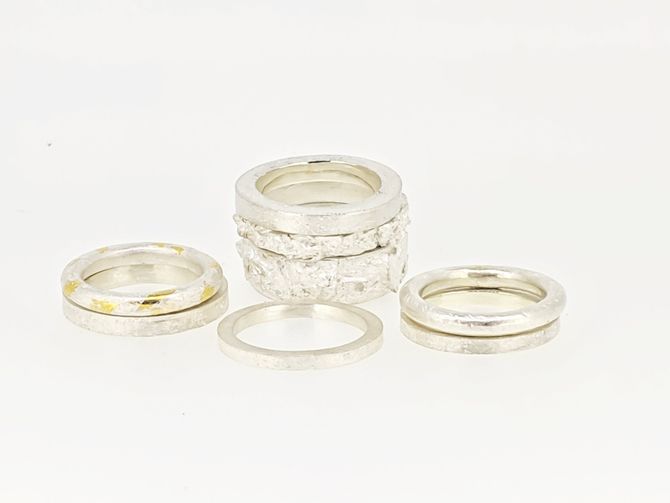 A stack of silver rings
