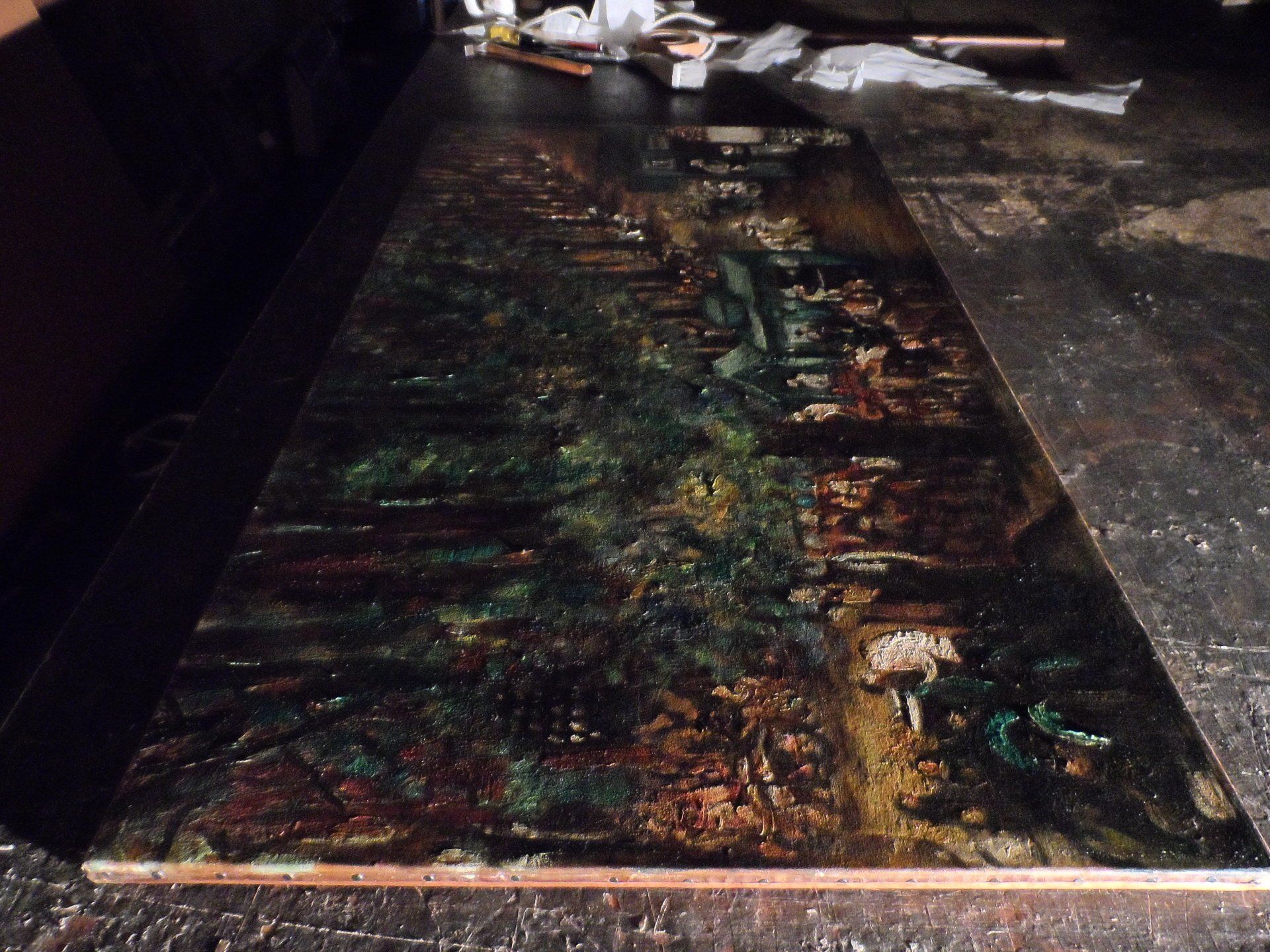 Improved canvas surface while preserving the original impasto after surface treatment and lining shown with raking light