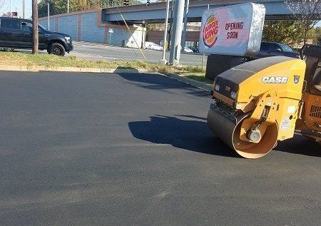 Steamroller on fresh asphalt
