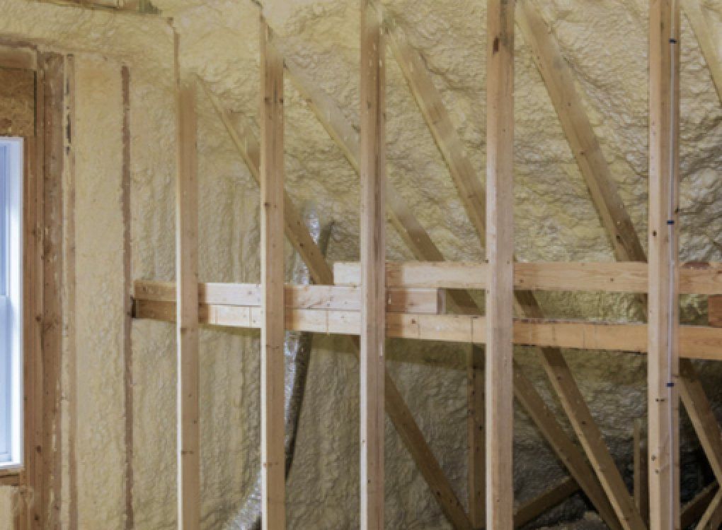 new home with spray insulation installation on walls and ceiling in Auburn AL
