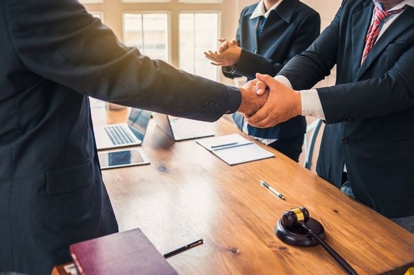 Business people shaking hands