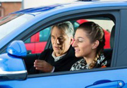 Young woman at driving lesson - driving school in Butler, NJ