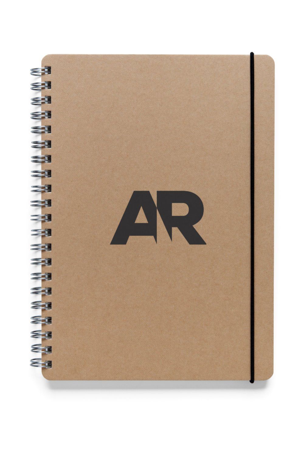 A spiral notebook with the letter ar on it