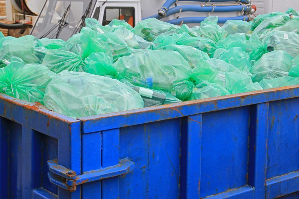 plastic bags in the dumpster