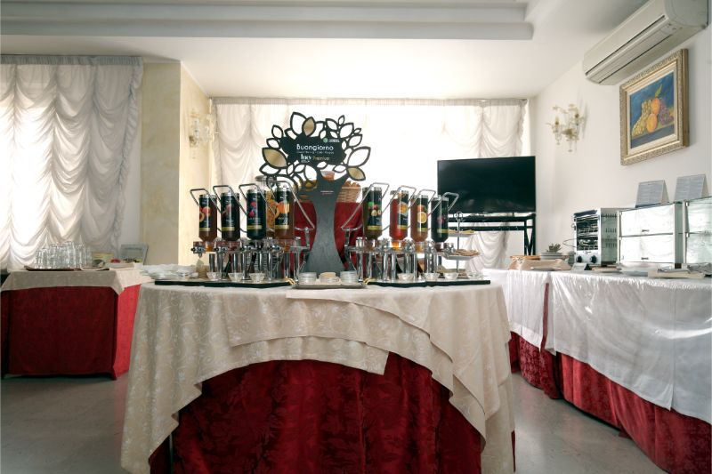room with a table set with drinks