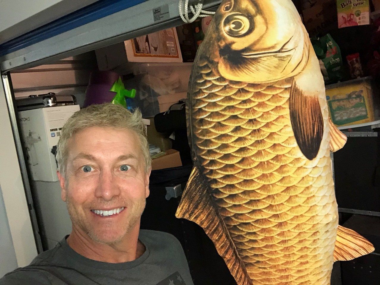 Joe Romano from Ultimate School Shows with large fish prop
