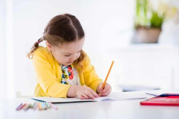 little girl coloring