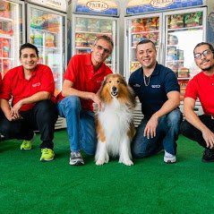 Men Sitting With Dog — Studio City, CA — Rusty’s Discount Pet Center Men Sitting With Dog — Studio City, CA — Rusty’s Discount Pet Center