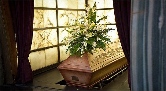 For help choosing the right crematorium, call 0141 424 0300 A coffin ready for cremation