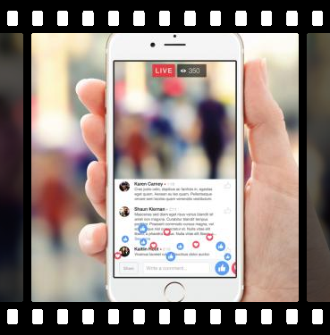Phone showing comments with lots of thumbs up and heart icons floating upwards