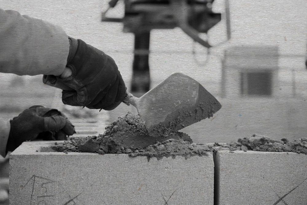 putting cement black and white