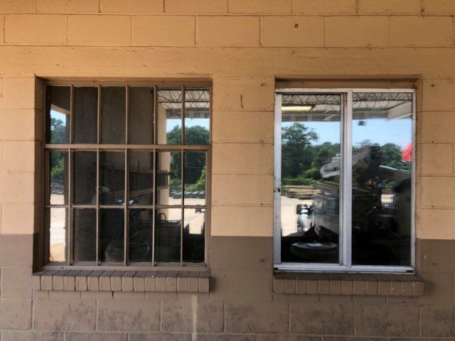 Business Tinting Auburn — Alabama Power's Glass Window Tinted in Auburn, AL Glazing System Auburn — Business with Glass Window Tinted in Auburn, AL