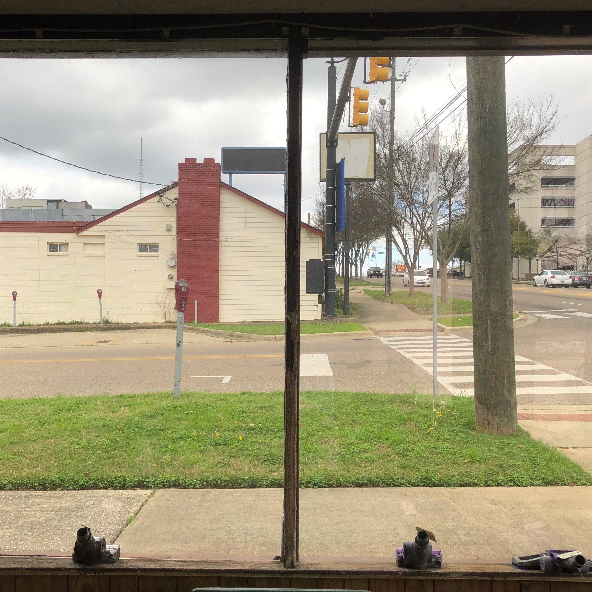 Looking out business window - After removal of old tint and replacement of SPF Light Bronze Tint
