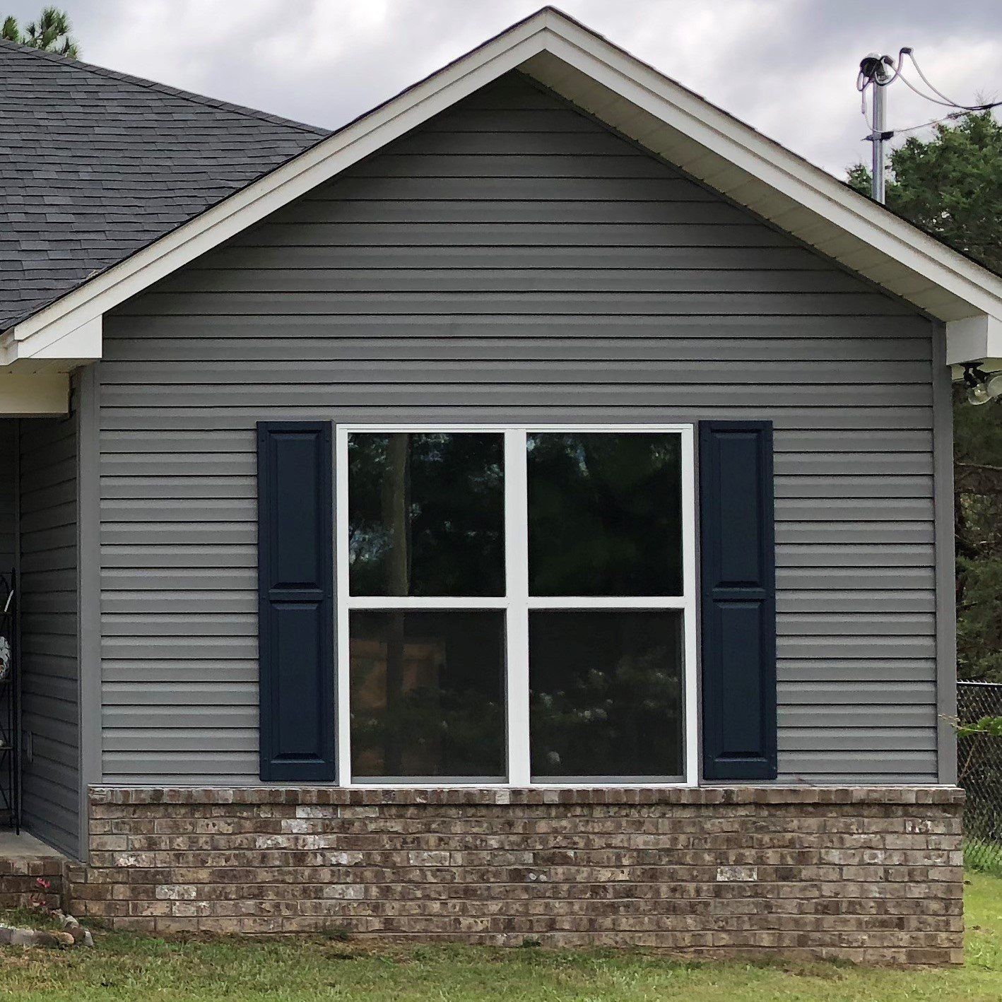 Decorative tinted home window blocking heat and glare