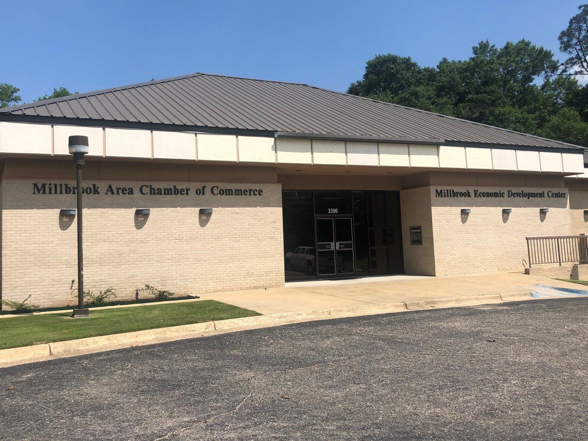 Professional tint installed to business windows and glass doors at Millbrook Chamber of Commerce in Millbrook, AL