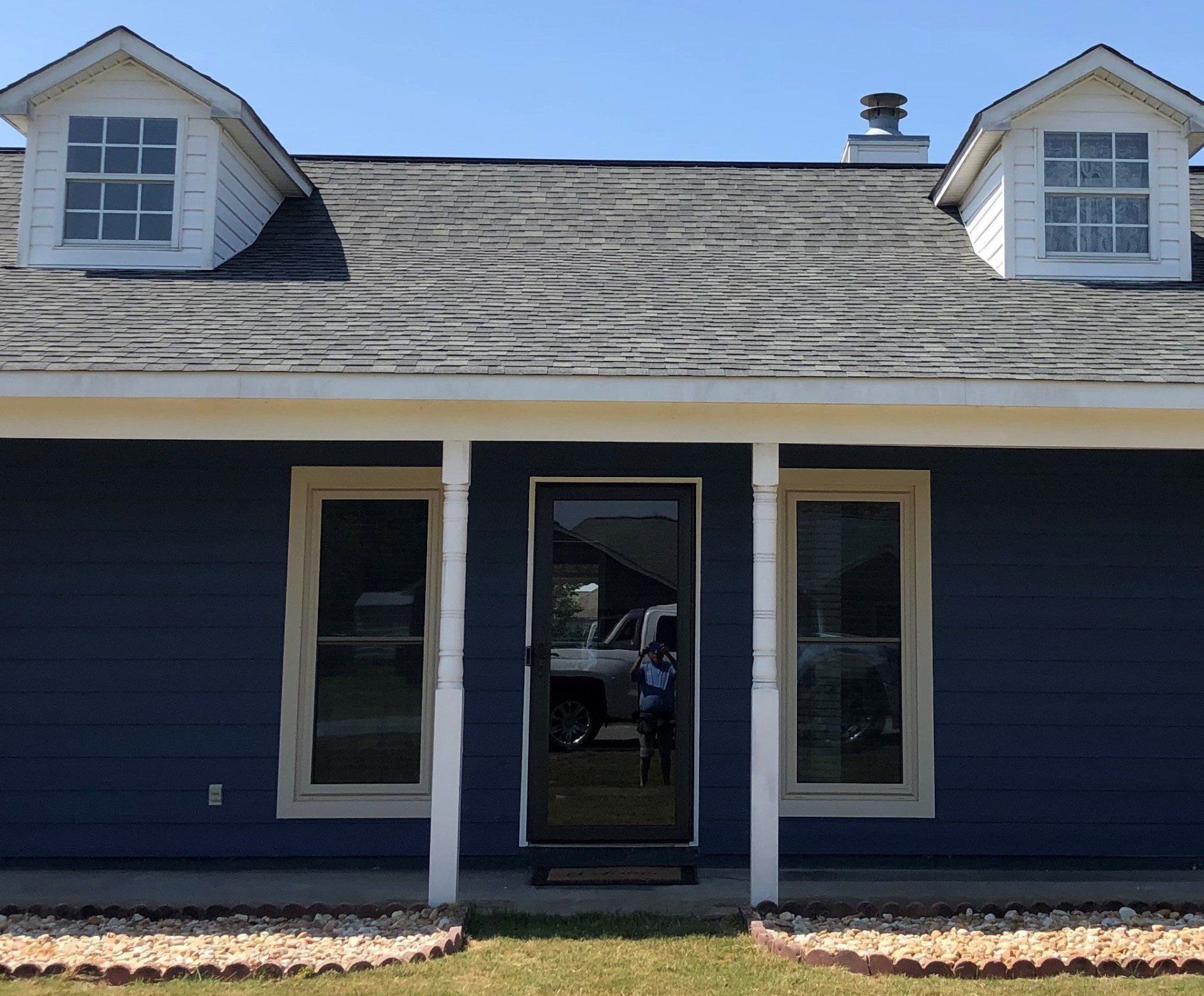 Heat penetrating windows and glass door before spf tint installed to home in East Alabama