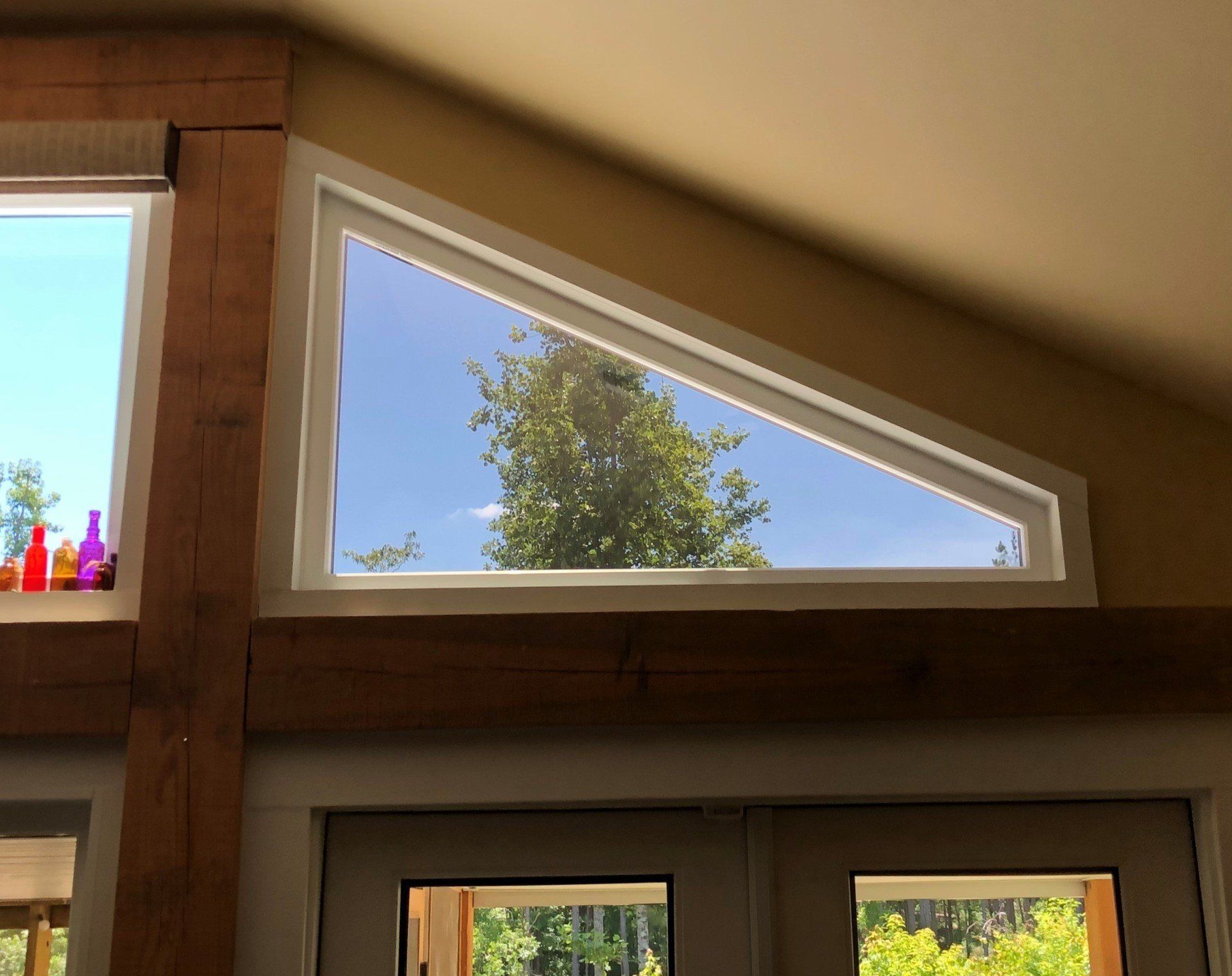 Home window tinting in Birmingham AL - SPF Residential Tint blocked heat and bright glare from entering the transom windows of this Birmingham home in Alabama.