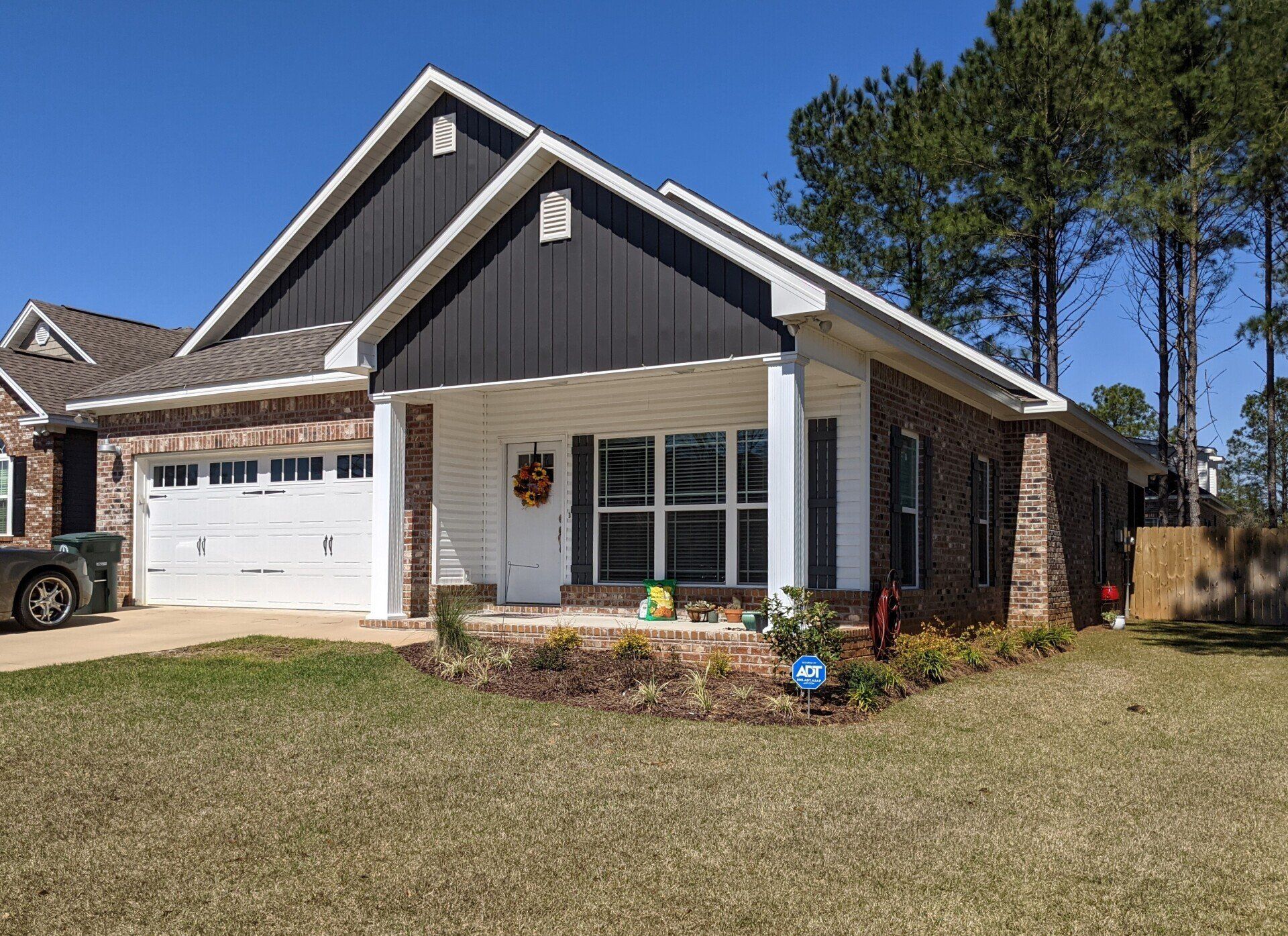 window tinting service in south AL - The bright Sun & UV passing through the glass windows of this home was subjecting everything inside to uncontrollable heat gain and Sun-fading before SPF residential tint installed in Enterprise, AL