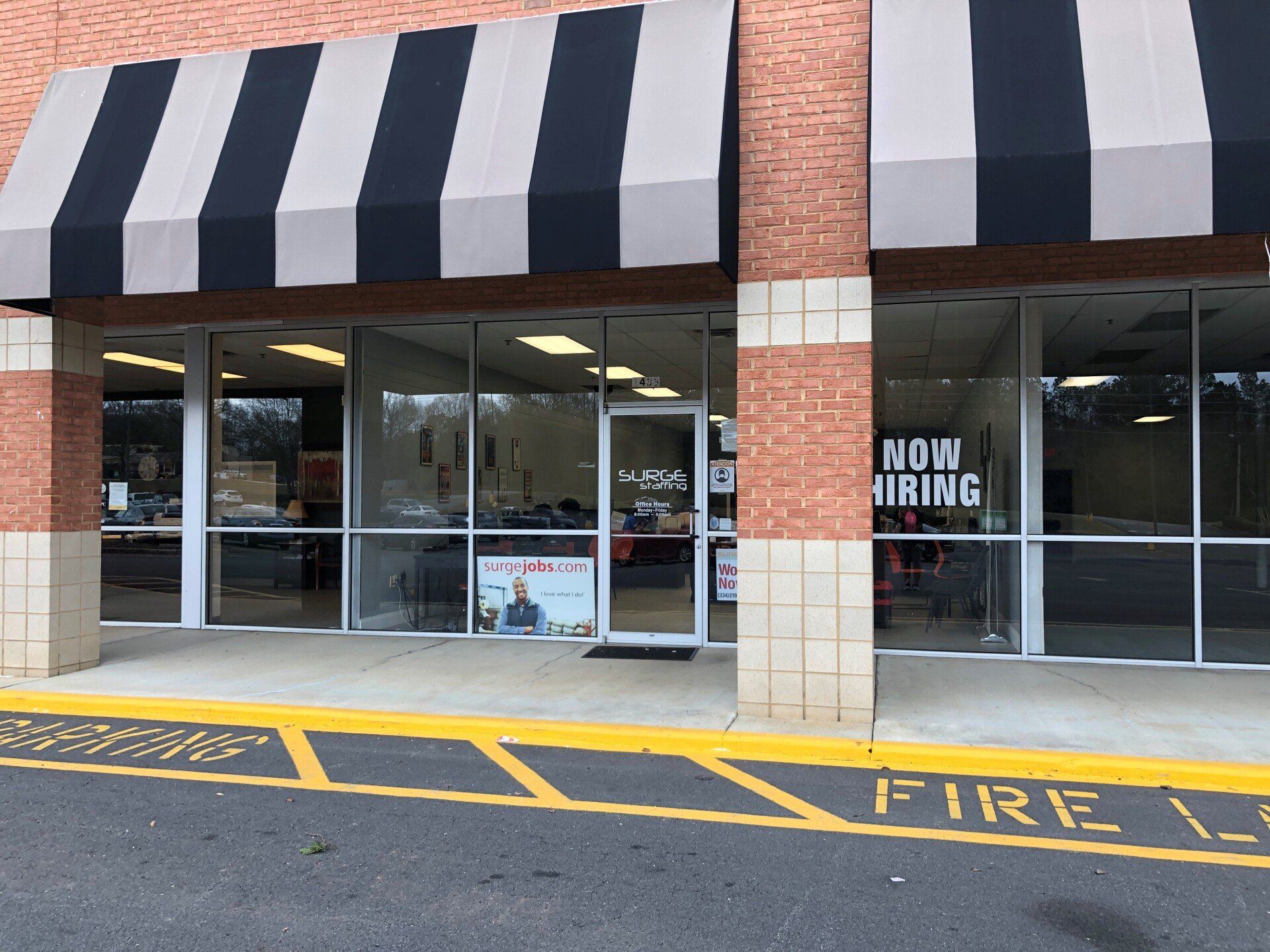business tint in Opelika AL - The awning above the windows did little to block the bright UV-Sun & Heat radiating this storefront before spf tint in Opelika, AL