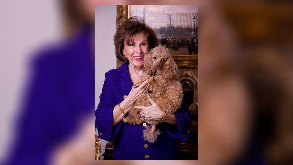 Cathaleen Curtiss with her Poodle