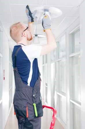 Man Repairing Broken Light - Electricians, electrical contractor in Goodhue, MN