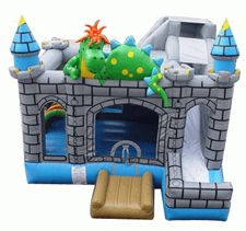 An inflatable castle with a dragon on top of it.