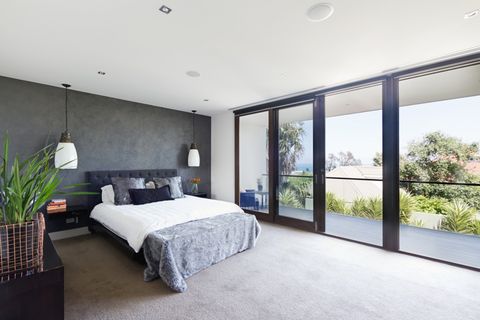 Interior Windows — A Bedroom With An Interior Window Design in Davie, FL Interior Windows — A Bedroom With An Interior Window Design in Davie, FL