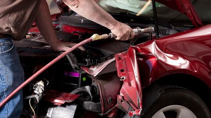 repairing a damaged car