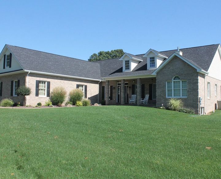 Home Builders — Beautiful Luxury Home Exterior at Twilight in Saxonburg, PA