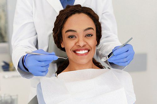 Woman Having Dental Checkup — Denham Springs, LA — Denham Finance, Inc.