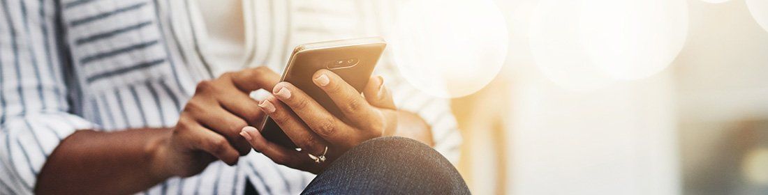woman holding phone