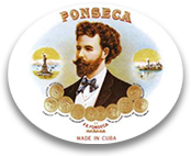 Una foto di un uomo con la barba e un papillon su un piatto bianco con la scritta Ponseca made in Cuba