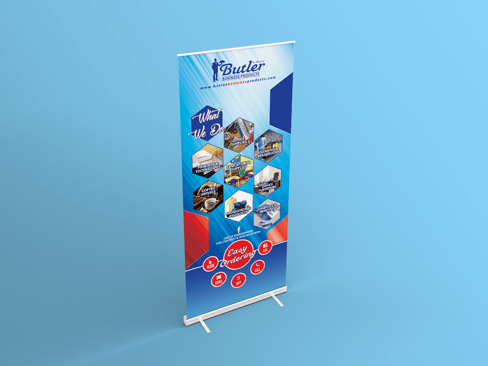 Roll-up banner for Butler Construction, blue and white, featuring construction site images.