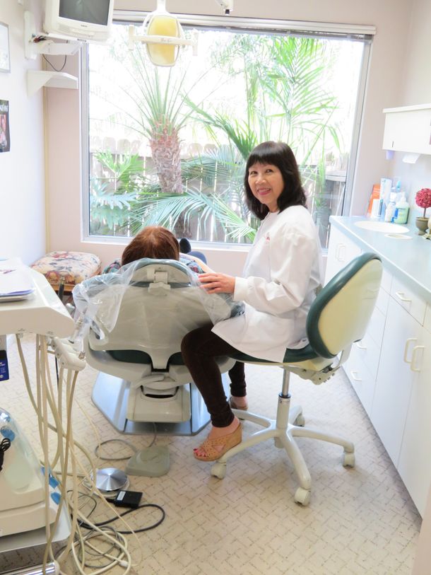 Dr. Pham-Nguyen with a patient