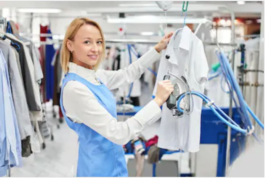 Woman dry cleaning shirt