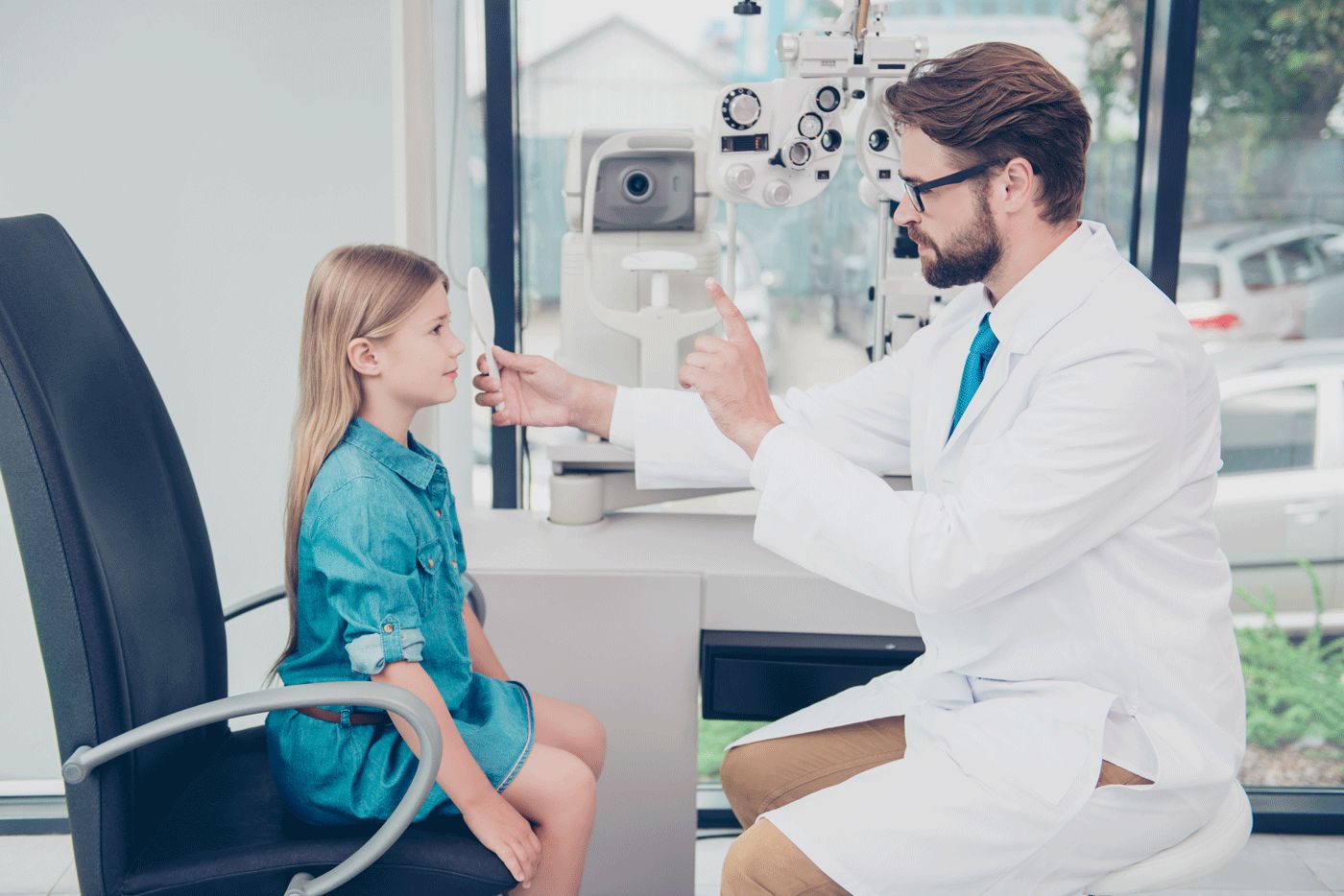 young girl getting her eye checked