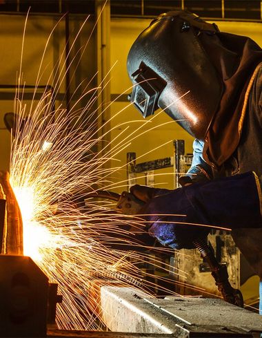 Welding — Welding Automotive Part in a Car Factory in Davenport, IA Welding — Welding Automotive Part in a Car Factory in Davenport, IA
